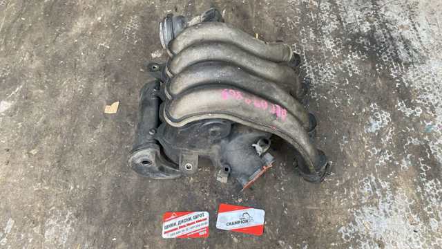 Колектор впускний 06B133213J VAG