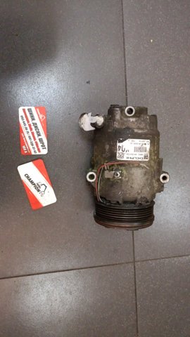 Компресор кондиціонера 13346494 GM
