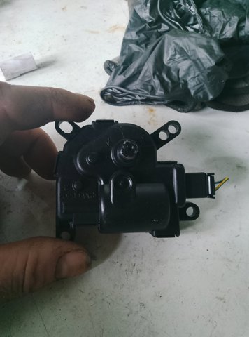 Мотор заслінки печі 1S7H19B634AA FORD