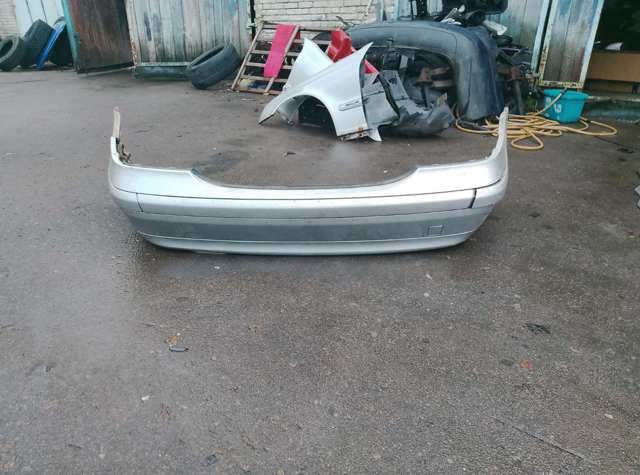 Бампер задній 2038850825 MERCEDES
