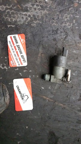 Моторчик омивача переднього скла 7700428390 RENAULT