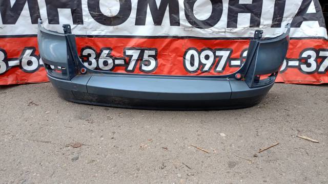 Бампер задній 8200582944 RENAULT