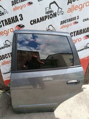 Двері пасажирськи задні ліві Nissan Almera TINO