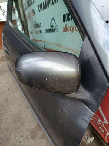 Праве бокове дзеркало Nissan Almera TINO