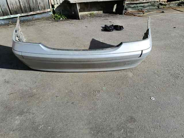 Лівий кронштейн кріплення бампера заднього A2038850114 MERCEDES
