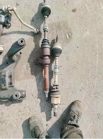 Привід лівий FG0125600D MAZDA