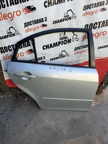 Двері задні в зборі GRYF7202XE MAZDA