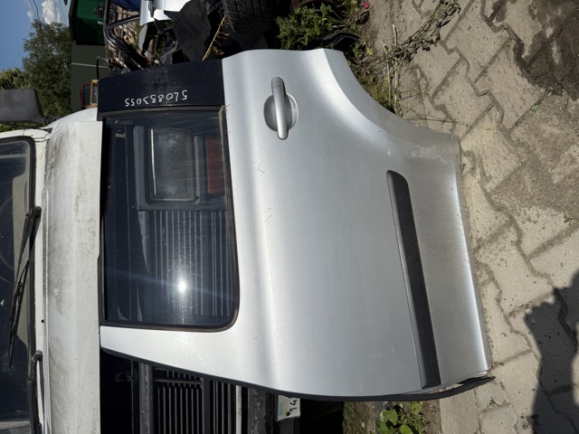 Двері пасажирськи задні ліві 5L0833055 VAG