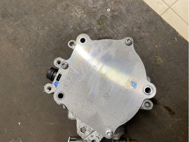 Насос вакуумний 06K145100BB VAG