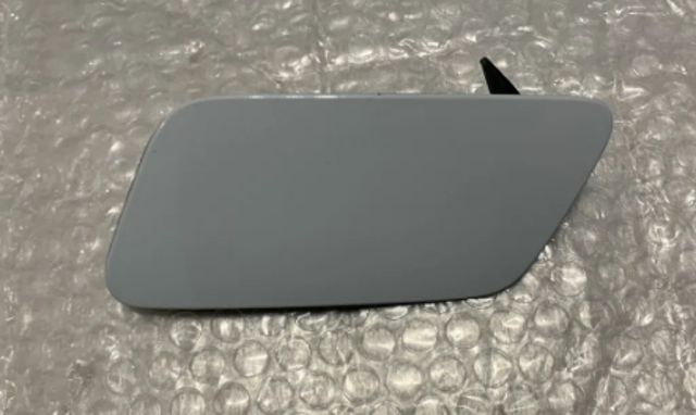Накладка форсунки омивача фари передньої 8V5955275 VAG