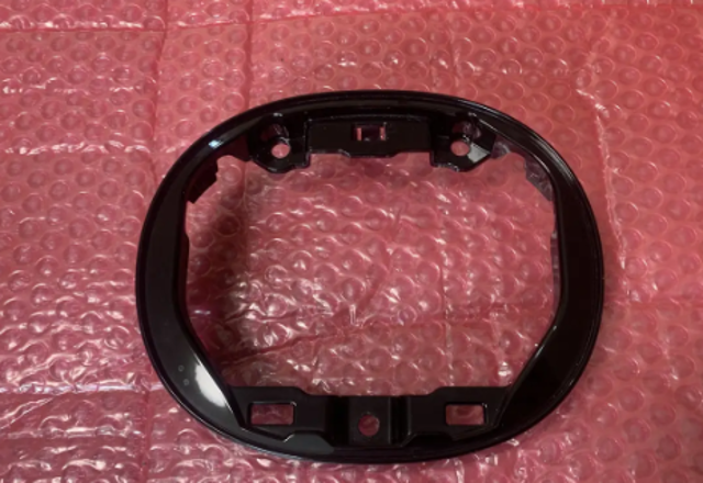 Кронштейн емблеми решітки радіатора DFS650721 MAZDA