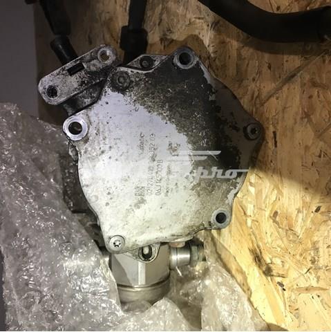 Насос вакуумний 06J145100B VAG