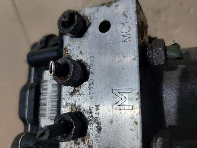 Блок АБС гідравлічний 476609U000 NISSAN