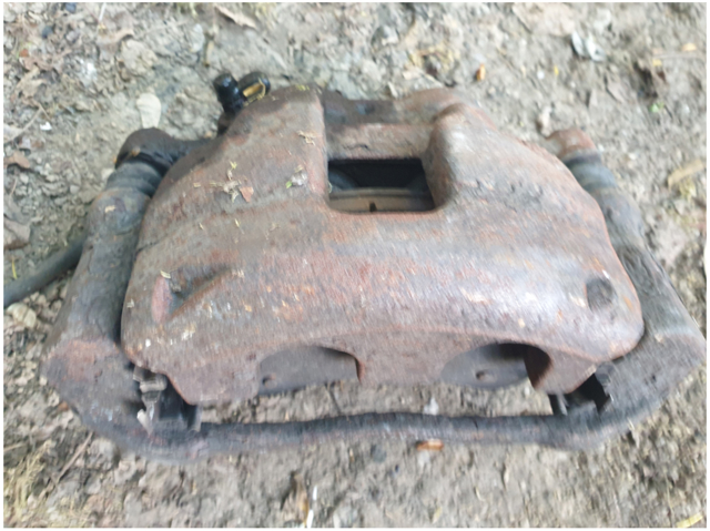 Супорт гальмівний, передній, правий 1521149 FORD