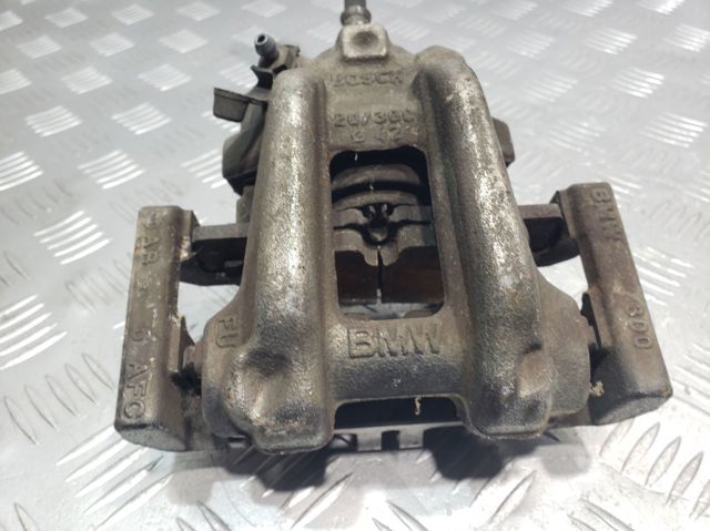 Супорт гальмівний задній правий 34216850858 BMW