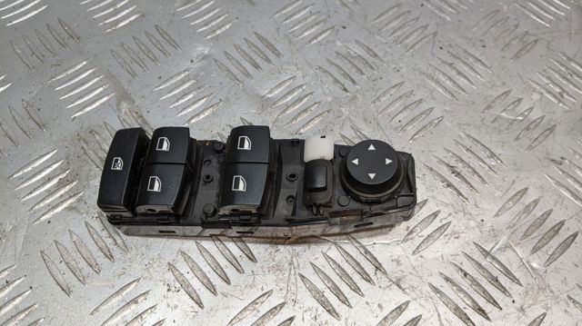 Кнопки переднього лівого склопід'ємника 61319208109 BMW