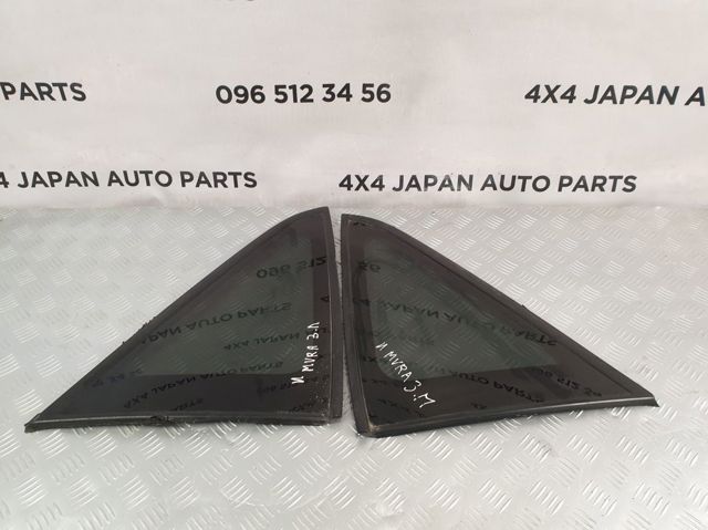 Скло багажного відсіку, ліве 83301CA000 NISSAN