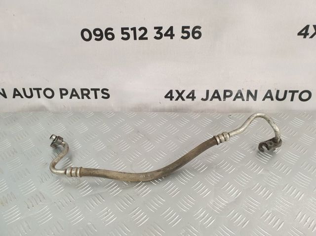 Шланг кондиціонера, від компресора до радіатора 92490CA000 NISSAN