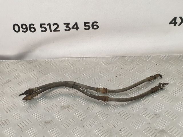 Шланг гальмівний передній EG2343980A MAZDA