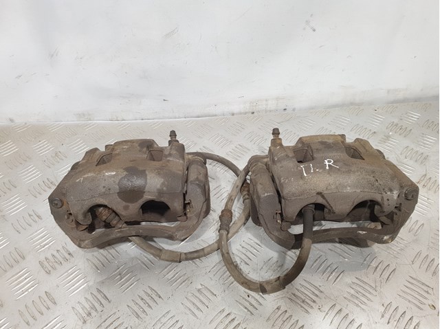 Супорт гальмівний, передній, правий L2Z63398ZA MAZDA