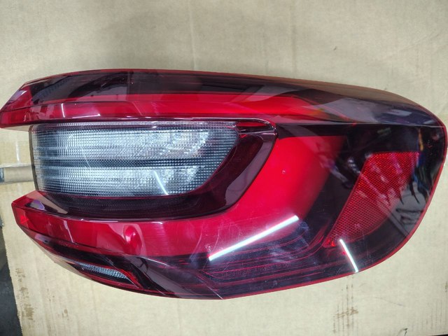Фара задня права зовнішня 63215A164B4 BMW