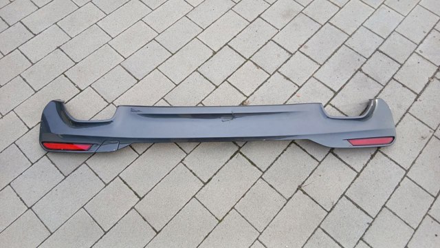 Накладка бампера заднього 51128064718 BMW