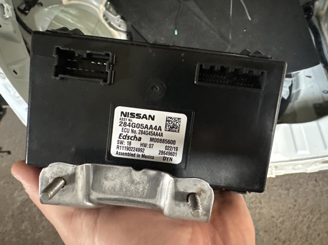 Блок управління відкриття кришки багажника 284G05AA4A NISSAN