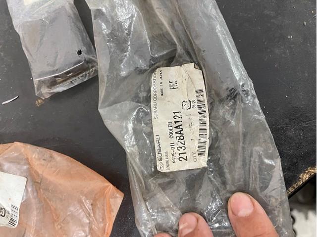 Відводна труба масляного радіатора 21328AA121 SUBARU
