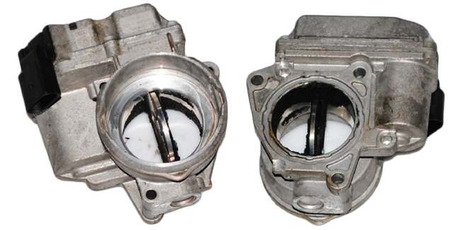 Дросільна заслінка в зборі 03G128063C VAG
