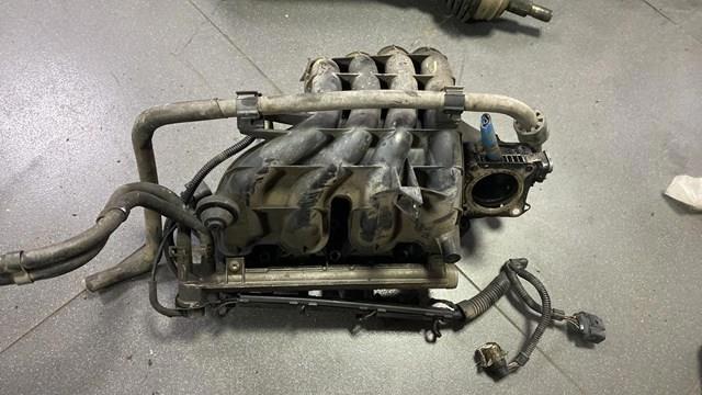 Колектор впускний 036129711BK VAG