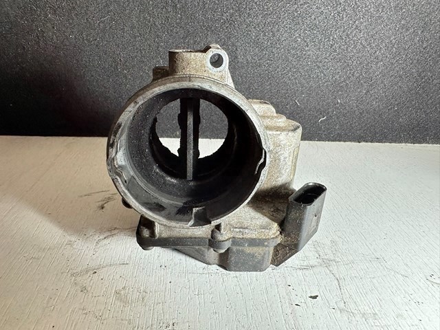 Дросільна заслінка в зборі 03G128063Q VAG