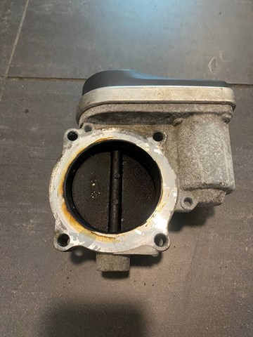 Дросільна заслінка в зборі 04861691AA CHRYSLER