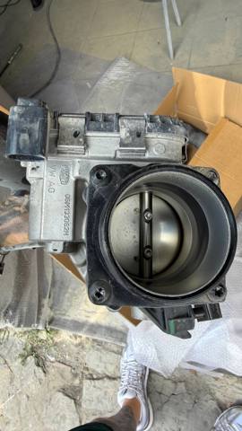 Дросільна заслінка в зборі 06M133062H VAG