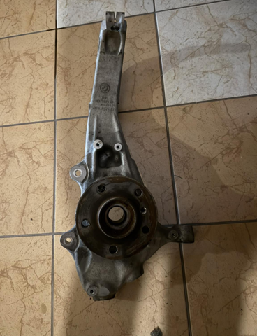 Цапфа поворотна права 31216876656 BMW