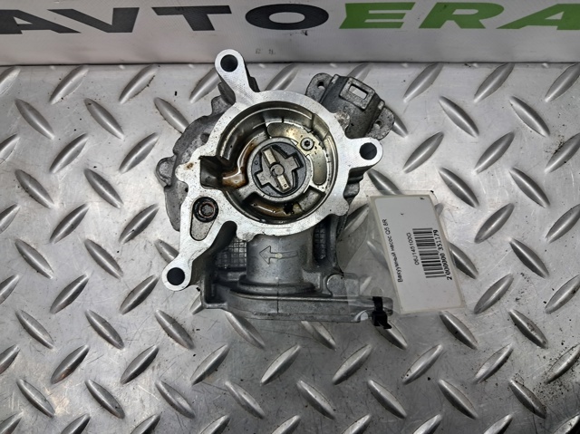 Насос вакуумний 06J145100G VAG
