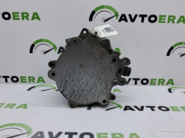 Насос вакуумний 06K145100BB VAG