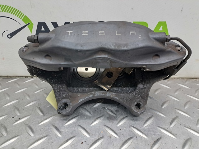 Супорт гальмівний, передній, лівий 100779400C TESLA