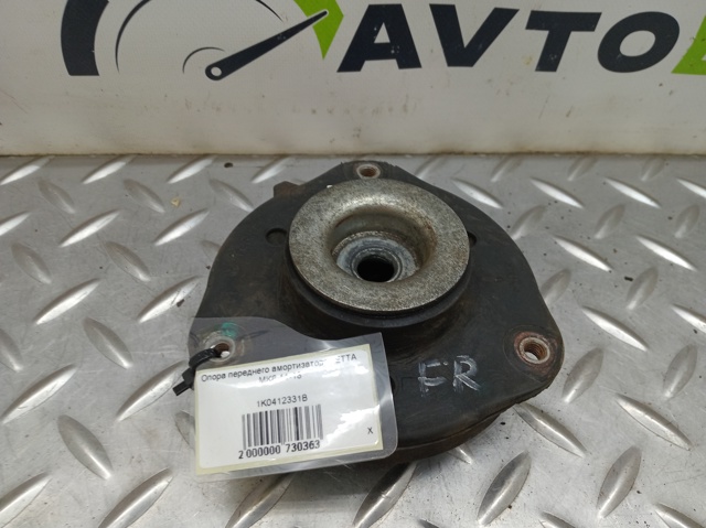 Подушка амортизатора переднього 1K0412331B VAG