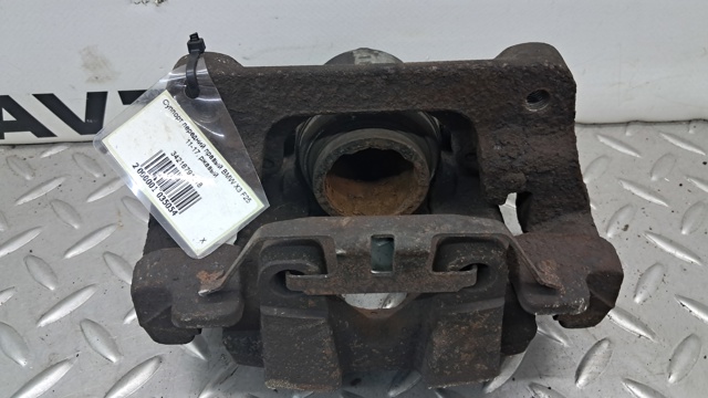 Супорт гальмівний задній правий 34216791018 BMW