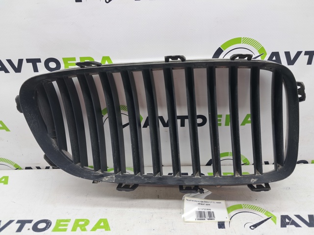 Решітка радіатора ліва 51137203649 BMW