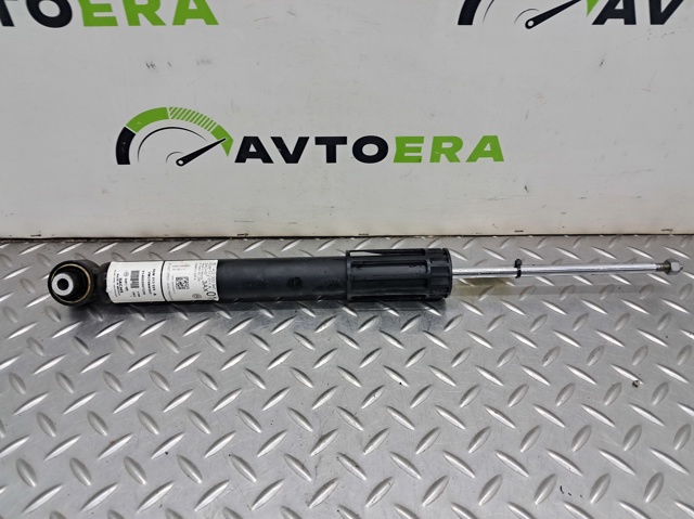Стійка амортизатора задня 5QM513029A VAG