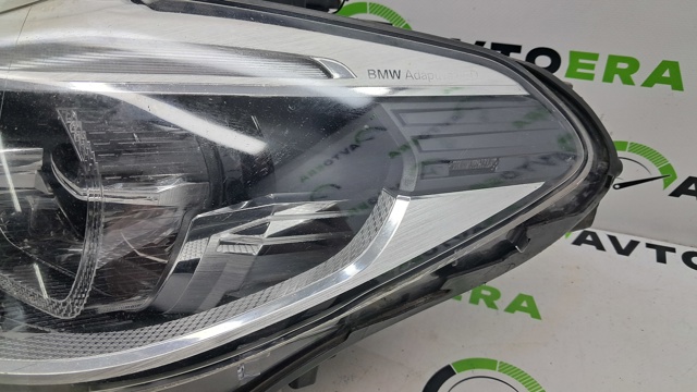 Фара ліва 63117214965 BMW