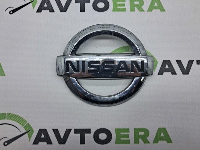 Емблема на кришку багажника, фірм.значок 908904EA0A NISSAN