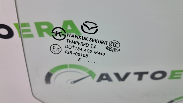 Скло заднє праве BHN172510A MAZDA