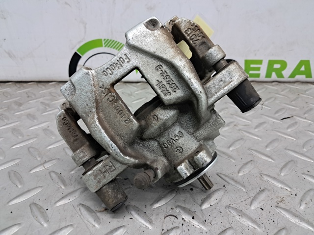 Супорт гальмівний задній правий JX6Z2386L FORD