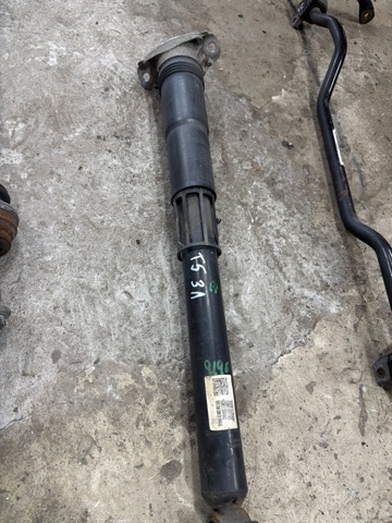 Стійка амортизатора задня 5QN513049AQ VAG