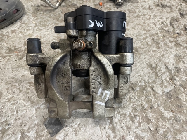 Задній гальмівний супорт лівий F2GZ2553A FORD