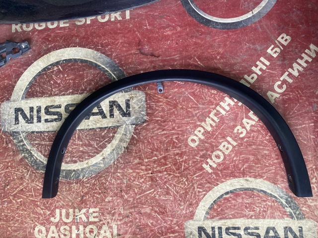 Накладка передньої лівої арки колеса 638614CE1A NISSAN