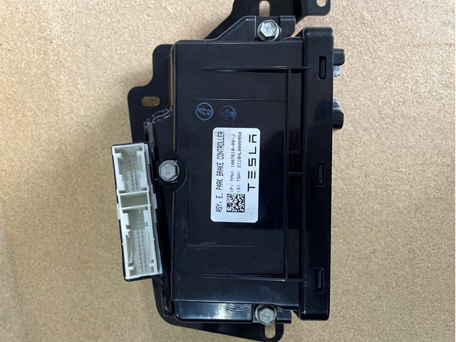 Блок стоянкового гальма 100761800J Tesla Model