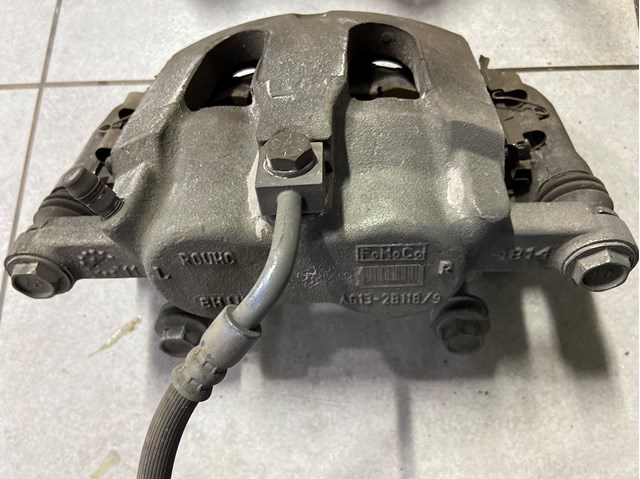 Супорт тормзной 8A8Z2B121AA FORD